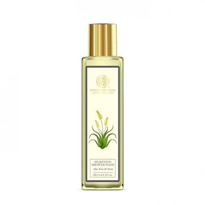 Gold bottle with a label featuring a plant design on a white background