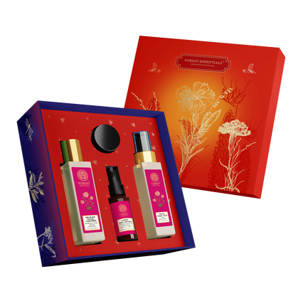 A gift box from Forest Essentials featuring a collection of skincare products with a theme of Indian Rose, including a facial cleanser, facial tonic mist, facial gel, and a light day lotion.