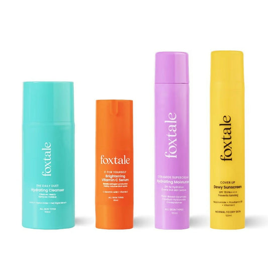 Four Foxtale skincare products in different colors on a white background