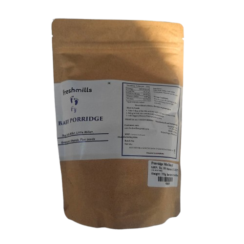 Brown package of freshmills baby porridge with label on a white background