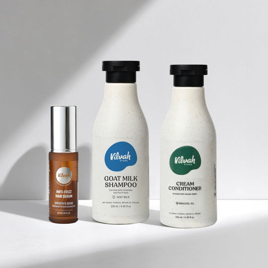 Vilvah skincare products including serum, shampoo, and conditioner on a white background