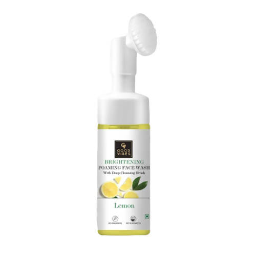 Brightening foaming face wash with lemon and green leaf design on a white background