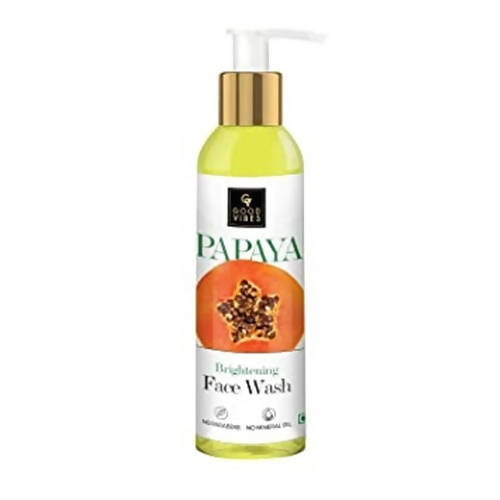 Papaya face wash bottle with pump on a white background