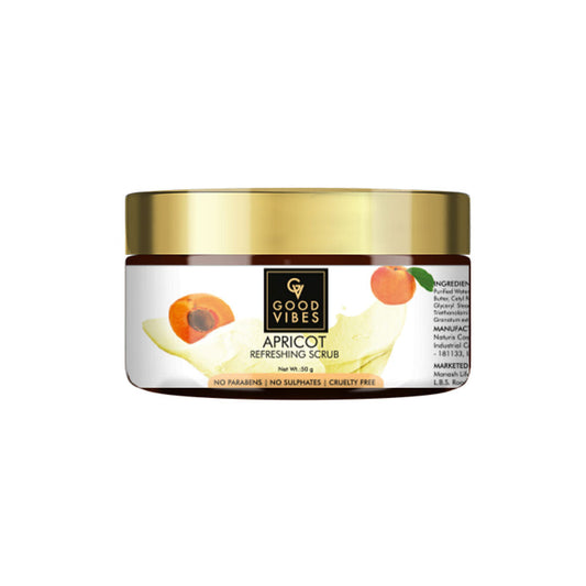 Jar of apricot refreshing scrub with gold lid on a white background
