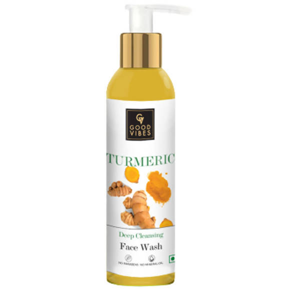 Turmeric face wash bottle with pump on a white background