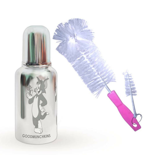 Silver bottle with engraved character and cleaning brush on a white background