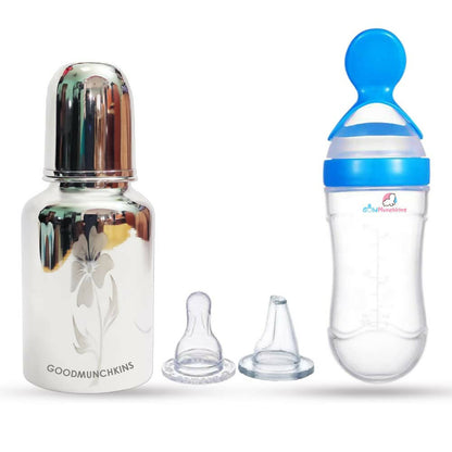 Two baby bottles with accessories on a white background, featuring the GoodMunchkins brand.