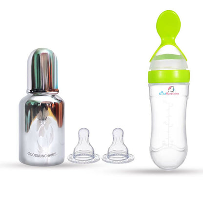 Bottle and sippy cup set with two silicone nipples on a white background