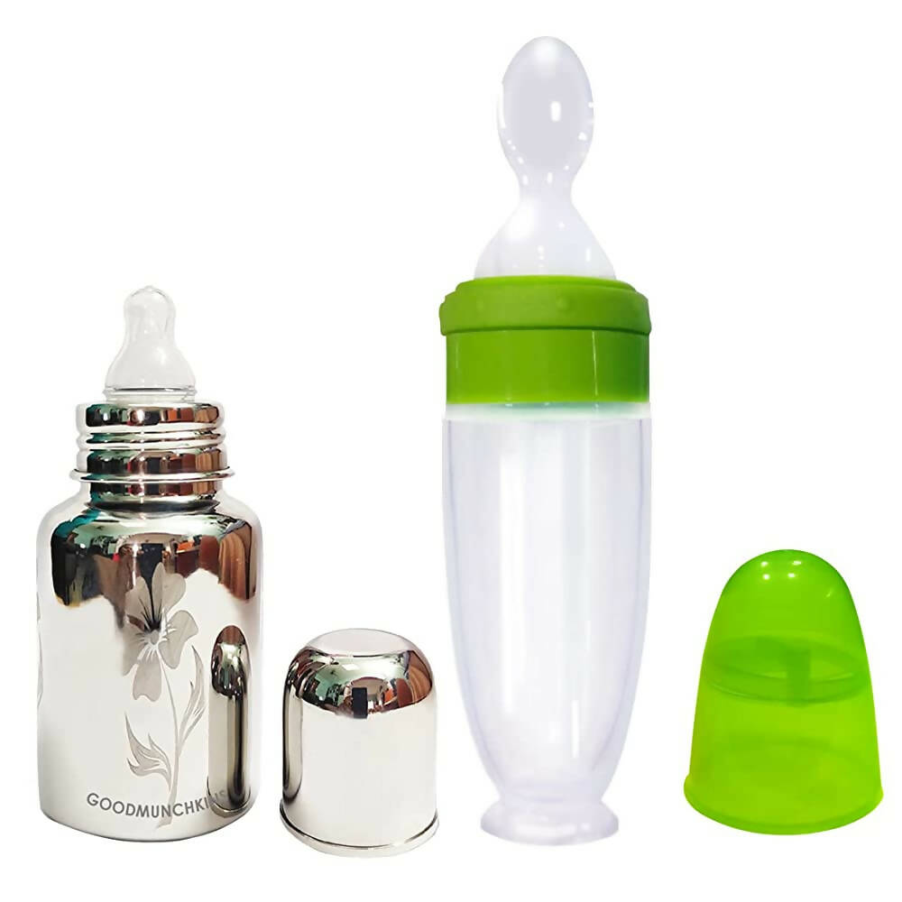 Set of baby bottles with different designs on a white background