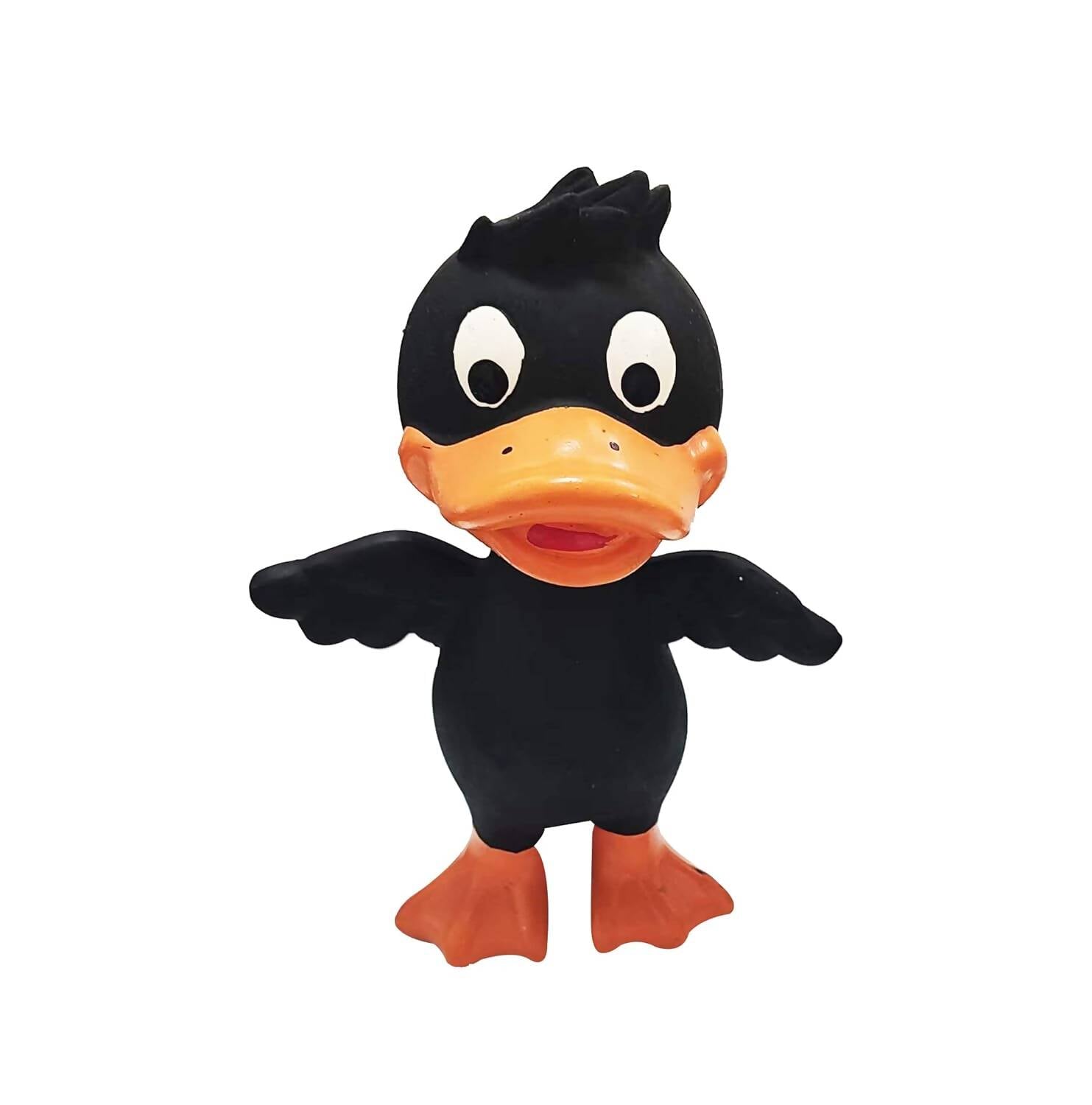 Black rubber duck with orange beak and feet on a white background