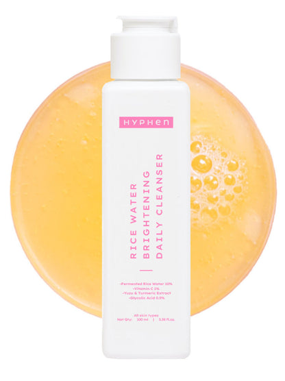 Hyphen rice water brightening daily cleanser with a yellow soap bar on a white background
