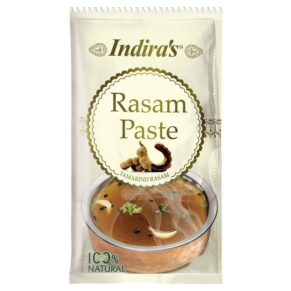 Indira's Rasam Paste packaging with a bowl of rasam on a white background