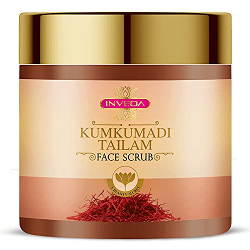 Jar of Inveda Kumkumadi Tailam Face Scrub with gold lid and label.