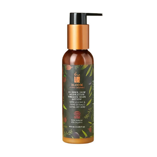Bottle of organic body oil with a pump on a white background