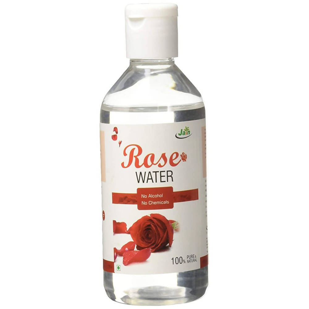 Bottle of rose water with a white cap on a white background