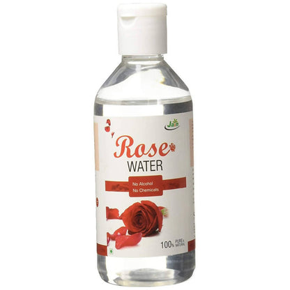 Bottle of rose water with a white cap on a white background