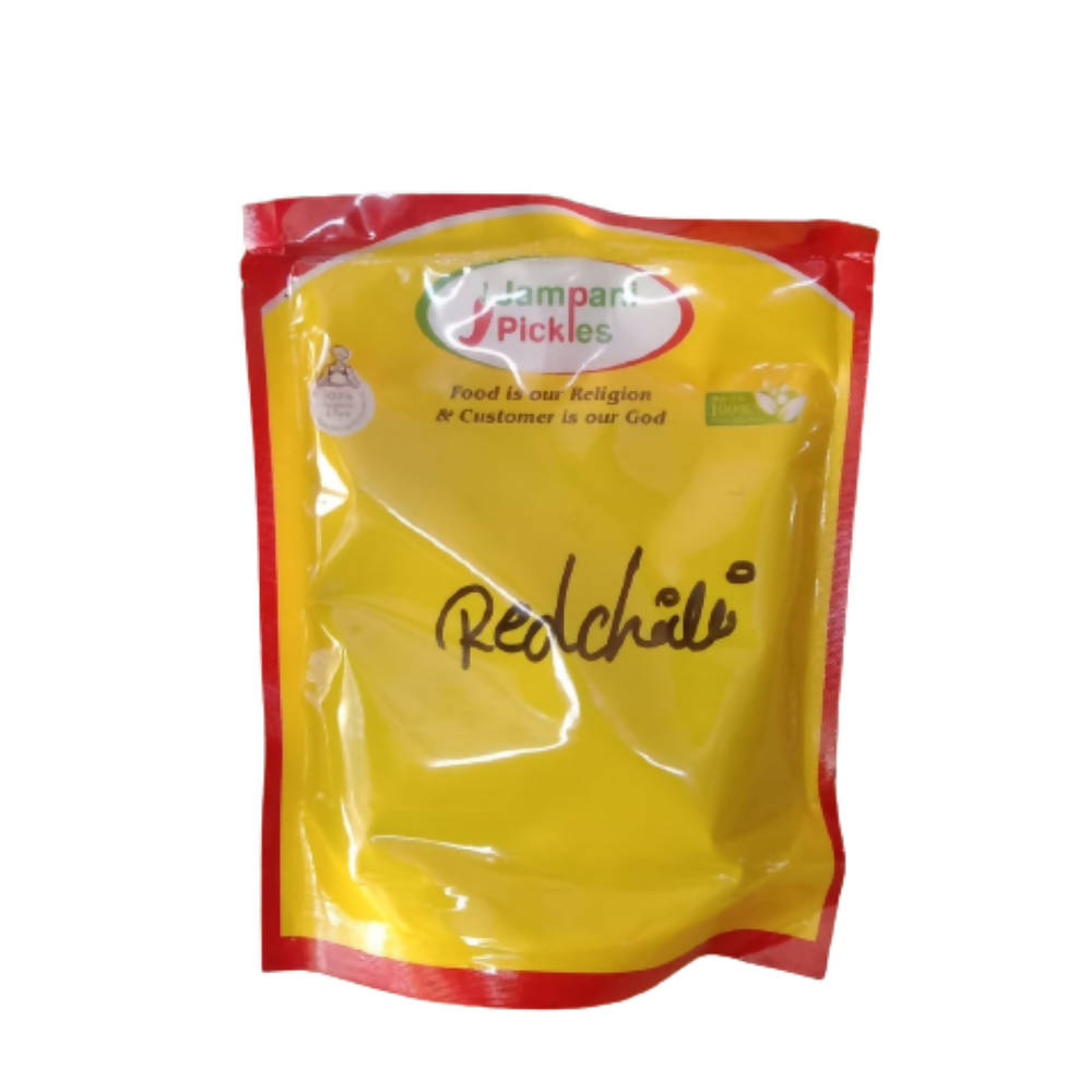 Yellow and red package of Tamarind Pickles with visible branding on a white background
