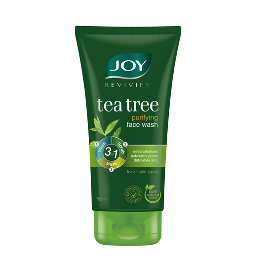 Green tube of JOY Revivify Tea Tree Purifying Face Wash on a white background