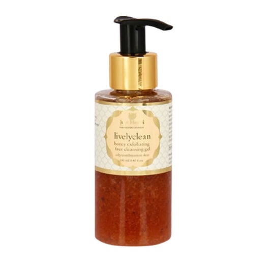 Bottle of livelyclean honey exfoliating facial scrub with a pump on a white background