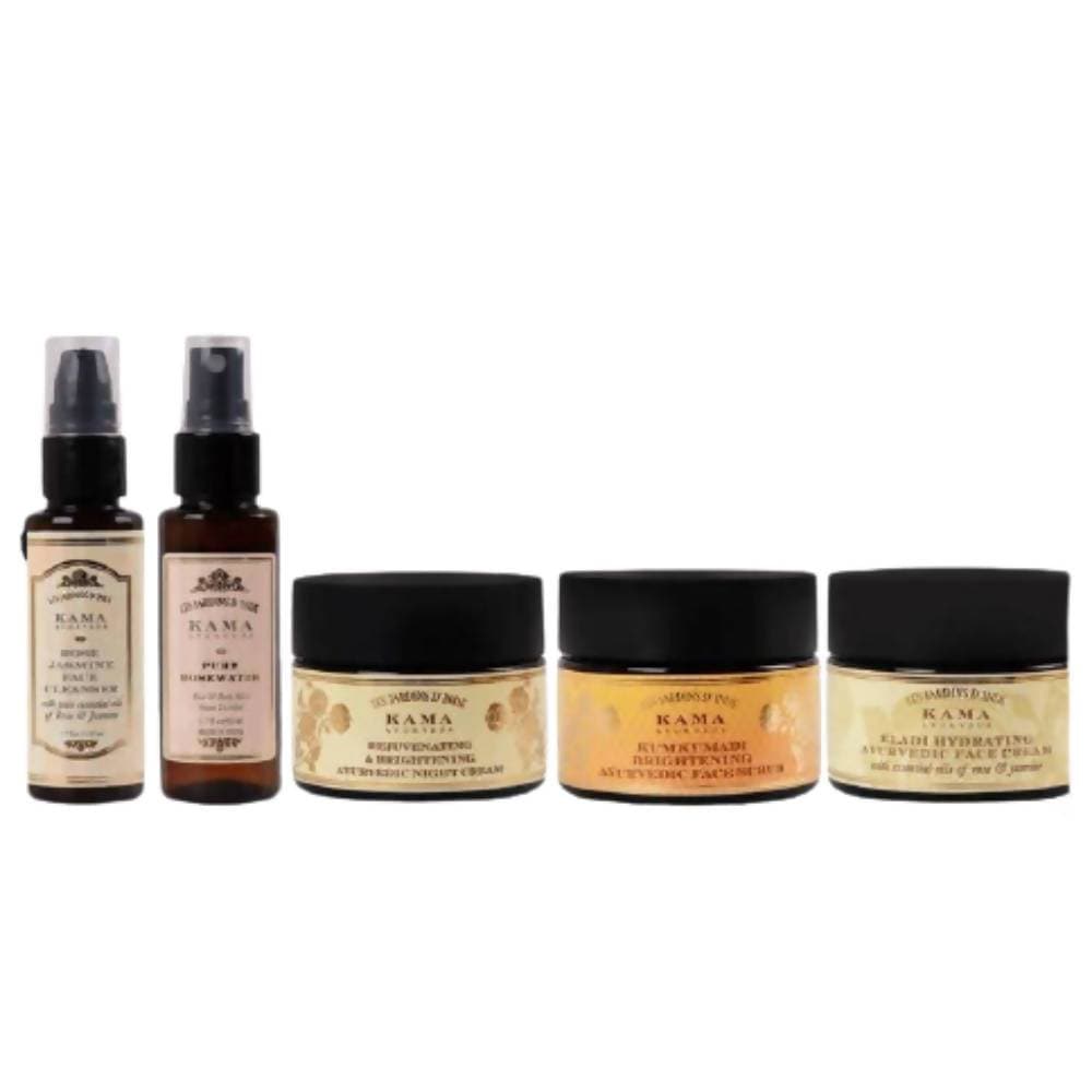 Set of Kama Ayurveda skincare products including bottles and jars on a white background