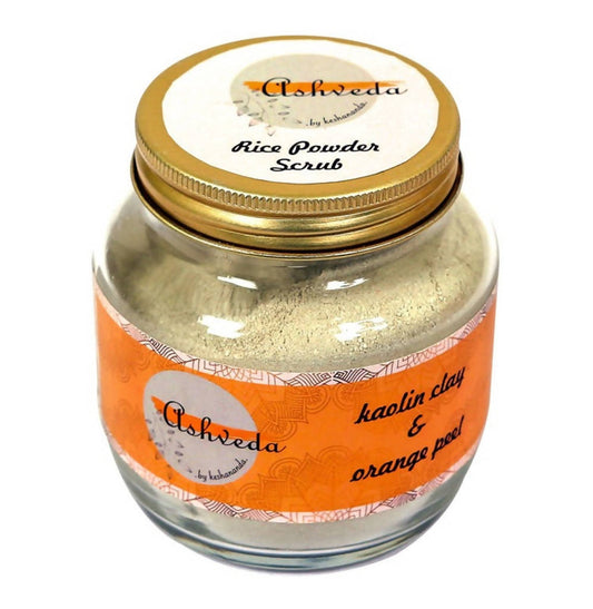 Jar of Ashveda rice powder scrub with gold lid on a white background