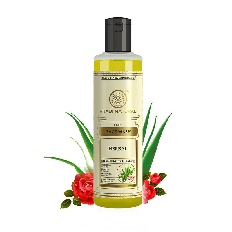 Khadi Natural Herbal Face Wash bottle with green leaves and red flowers on a white background