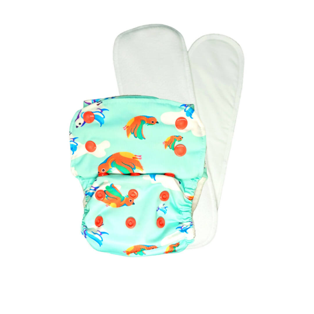 Two colorful baby diapers with a turtle pattern on a white background