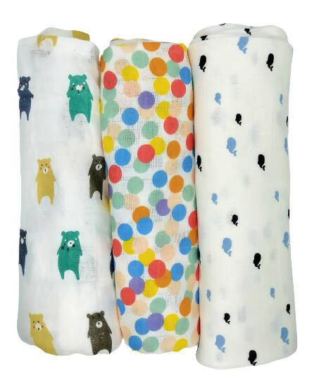 Three swaddle blankets with different patterns on a white background