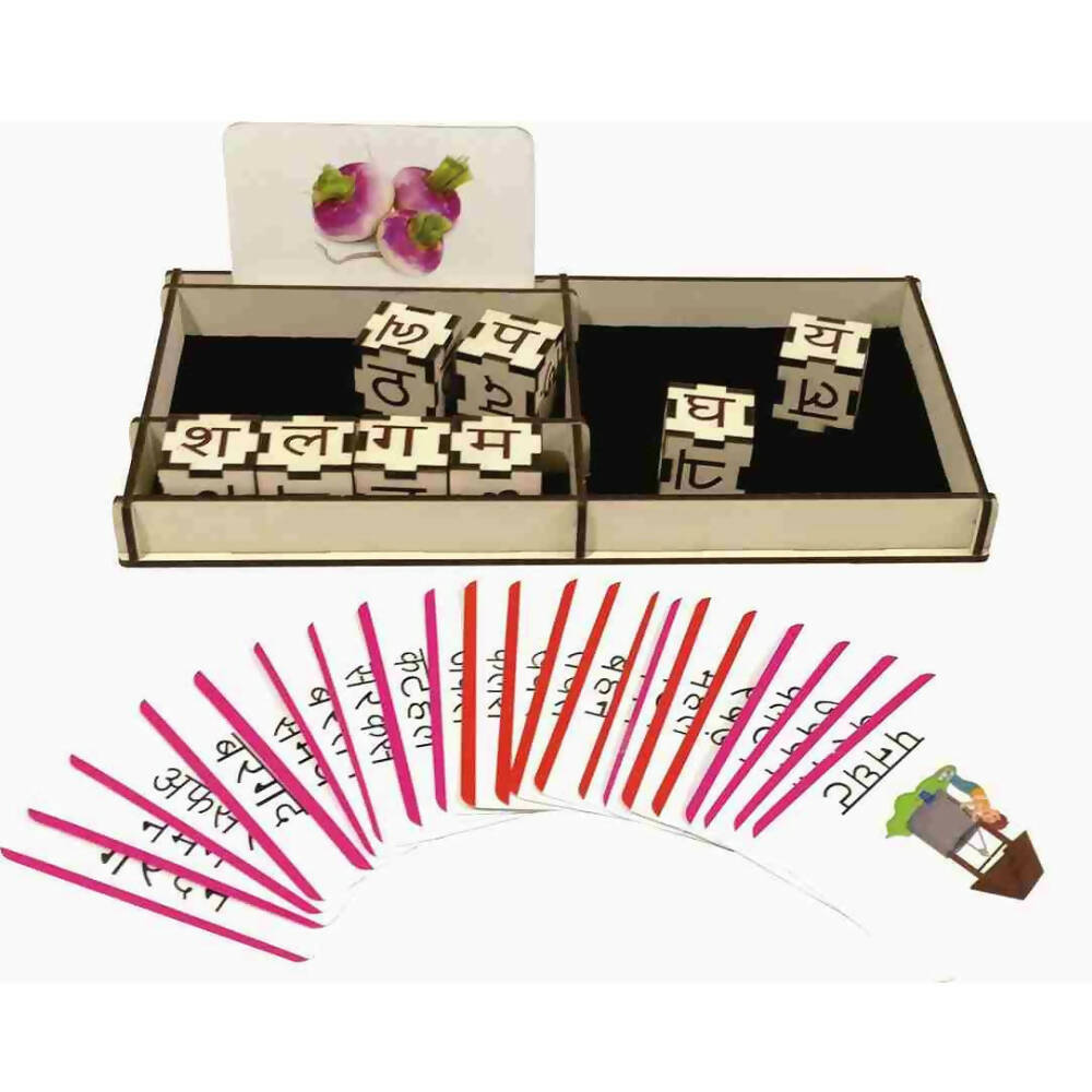 Set of letter tiles with a box and cards on a white background