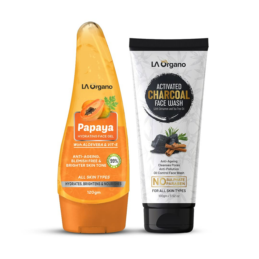 Orange bottle of La Organo Papaya Face Gel and white tube of LA Organo Activated Charcoal Face Wash on a white background