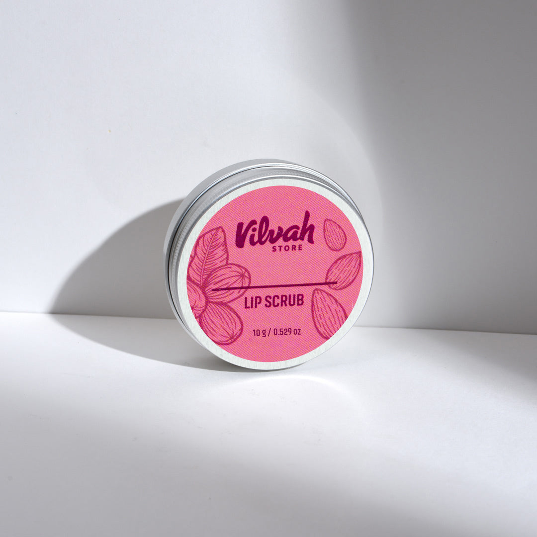 Lip scrub container with pink label on a white background