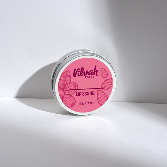 Lip scrub container with pink label on a white background