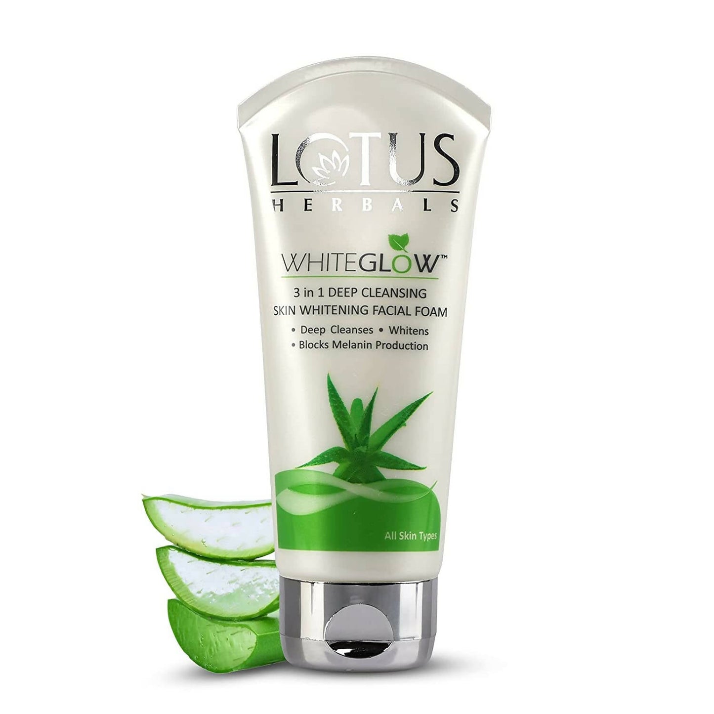 A tube of Lotus Herbals WhiteGlow 3-In-1 Deep Cleansing Skin Whitening Facial Foam with aloe vera slices in the foreground.
