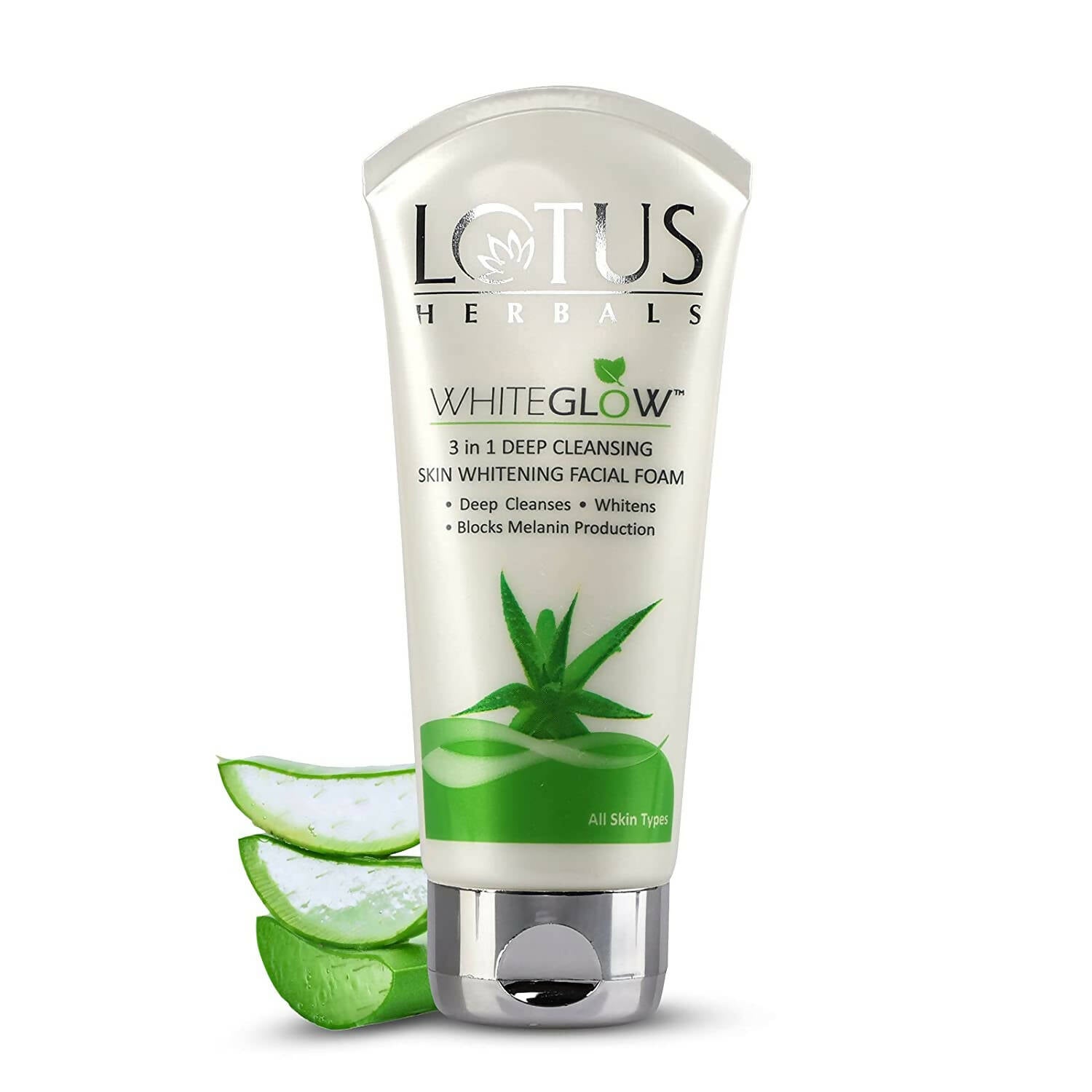 A tube of Lotus Herbals WhiteGlow 3-In-1 Deep Cleansing Skin Whitening Facial Foam with aloe vera slices in the foreground.