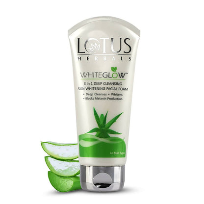 A tube of Lotus Herbals WhiteGlow 3-In-1 Deep Cleansing Skin Whitening Facial Foam with aloe vera slices in the foreground.