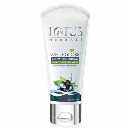 A tube of Lotus Herbals WhiteGlow Activated Charcoal Brightening Facewash with a white and blue color scheme.