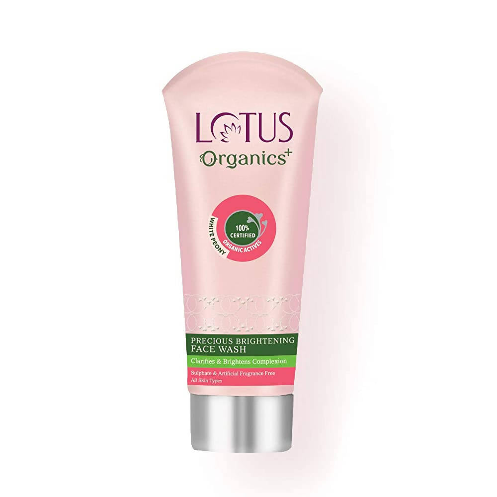 Pink tube of Lotus Organics face wash on a white background