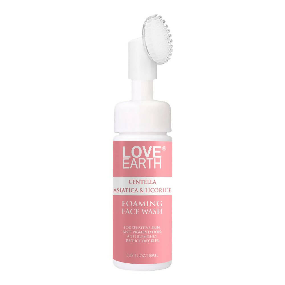 Love Earth foaming face wash bottle with brush on a white background