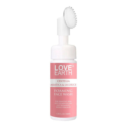 Love Earth foaming face wash bottle with brush on a white background
