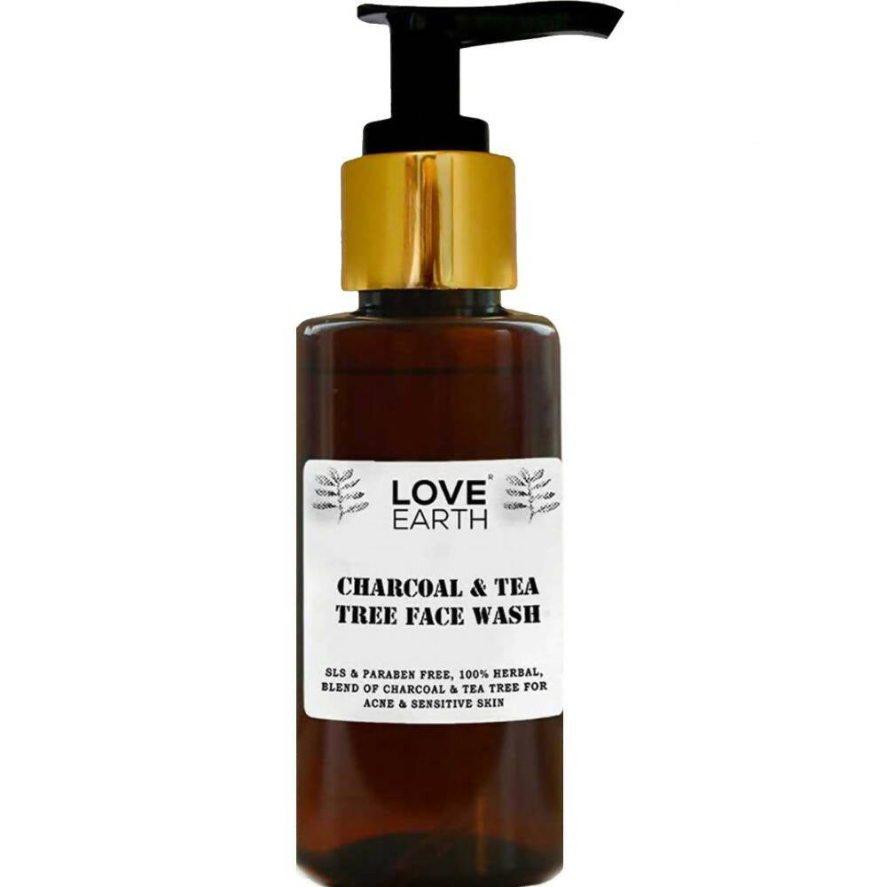 Brown bottle with gold pump labeled 'Love Earth Charcoal & Tea Tree Face Wash' on a white background