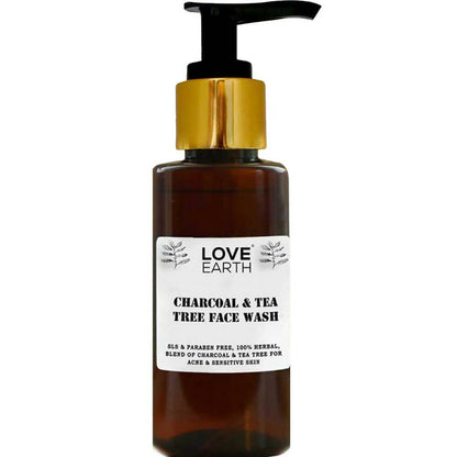 Brown bottle with gold pump labeled 'Love Earth Charcoal & Tea Tree Face Wash' on a white background