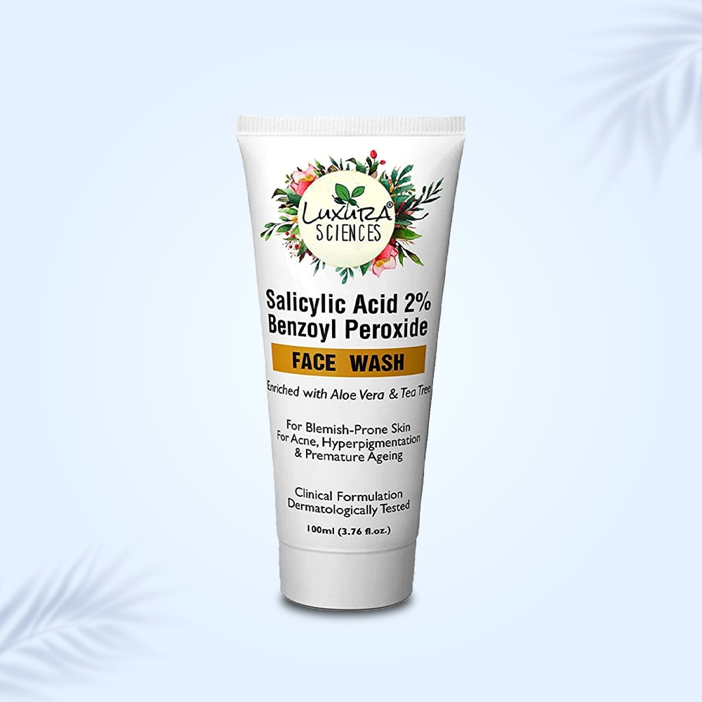 Tube of Luxura Sciences face wash on a light blue background