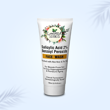 Tube of Luxura Sciences face wash on a light blue background