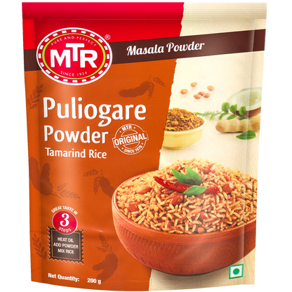 MTR Puliyogare Powder packaging with a bowl of rice and ingredients on a white background