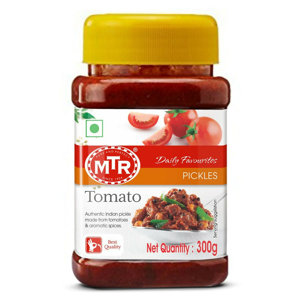 Jar of MTR Tomato Pickles with a yellow lid on a white background