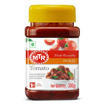 Jar of MTR Tomato Pickles with a yellow lid on a white background