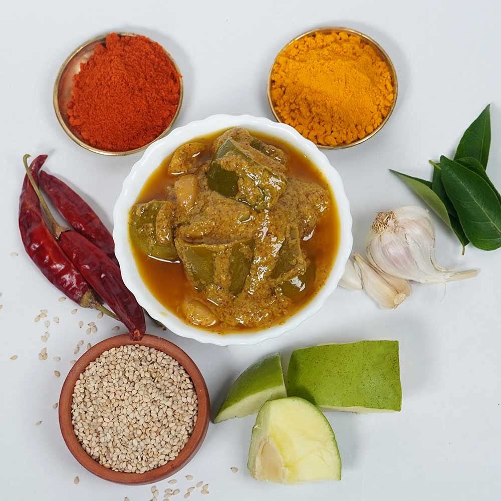 Spicy dish with ingredients including red chili peppers, garlic, and spices on a white background