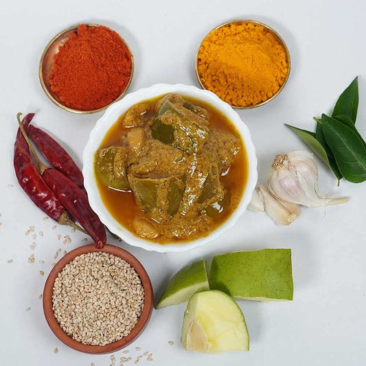 Spicy dish with ingredients including red chili peppers, garlic, and spices on a white background