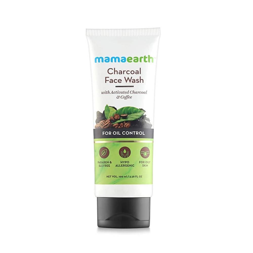 A bottle of Mamaearth Charcoal Face Wash for oil control, with active charcoal and coffee mentioned on the label.