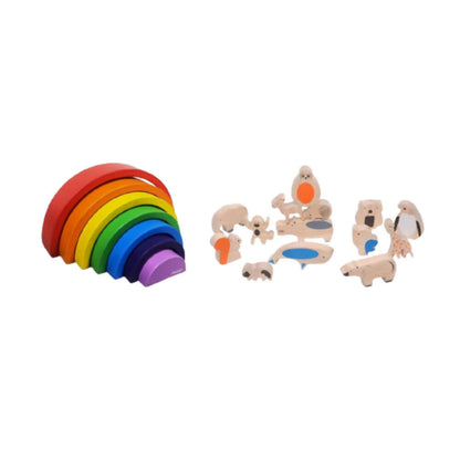 Set of wooden toys including a rainbow stacker and animal figures on a white background